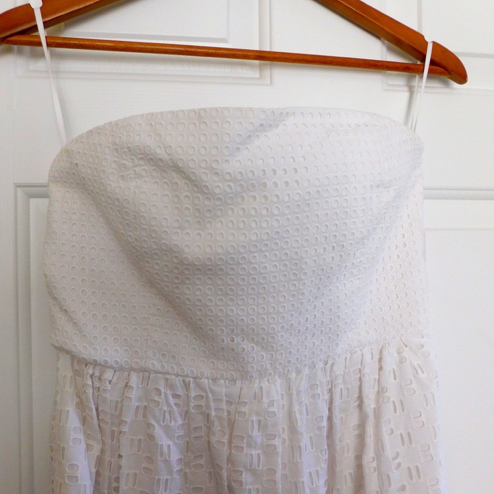 Strapless white mid length dress